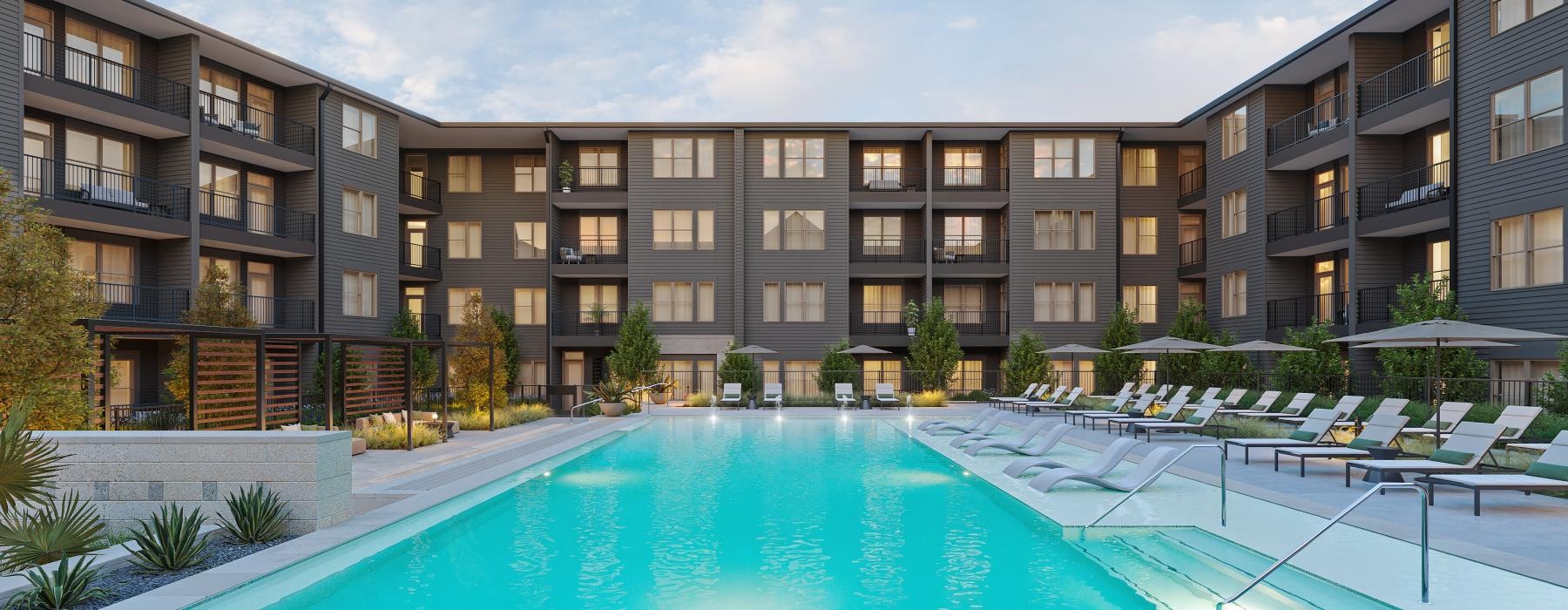 a swimming pool in front of a building
