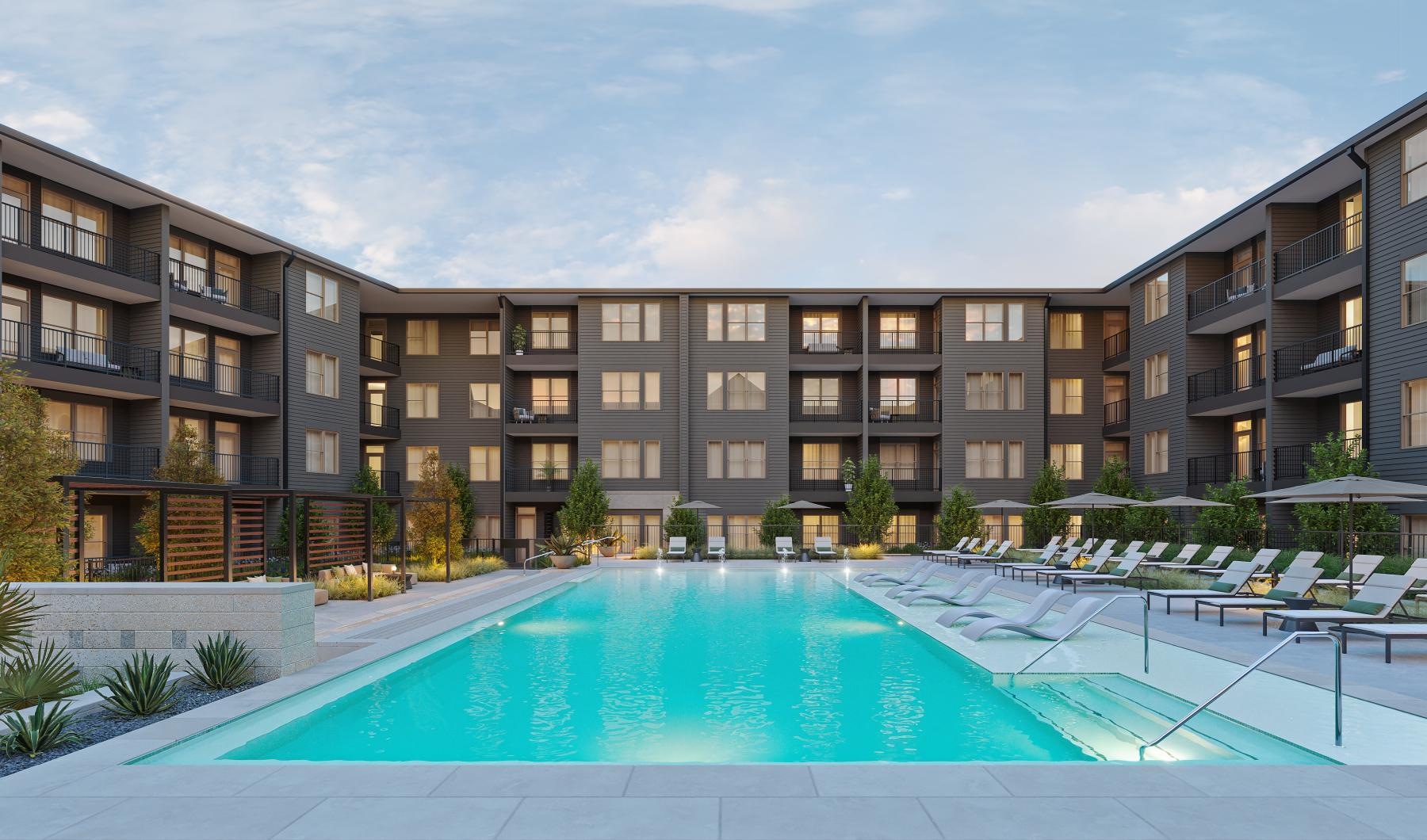 a swimming pool in front of a building